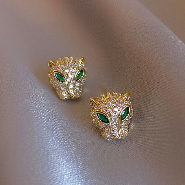 Glänzende Leoparden-Ohrringe in Gold